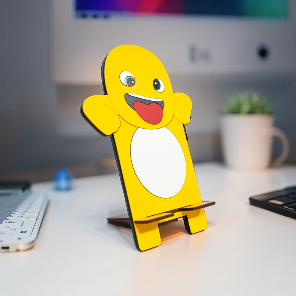 Soporte celular de madera MDF muñeco amarillo gracioso