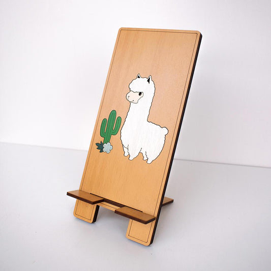 Soporte para Celular en MDF con figura de Alpaca fondo madera Haya